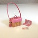 Fran Wasserman reviewed Dollhouse miniature wicker-style box bag