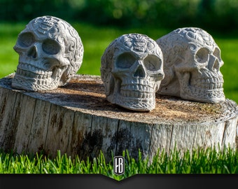 Concrete skull decorated with Celtic motifs, hand cast