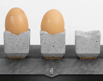 Set of 4 egg cups made of concrete with cork base