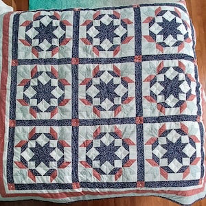 Vintage handmade star pattern quilt
