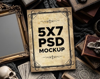 May include: A 5x7 PSD mockup with an ornate border, surrounded by antique books, tarot cards, a skull, and a gold-framed mirror. The mockup has a vintage parchment appearance with the text "5X7 PSD MOCKUP" in bold black letters. The scene has a dark, gothic aesthetic.