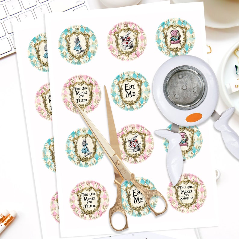 May include: Two sheets of white paper with printed Alice in Wonderland themed round stickers. The stickers feature images of Alice, the White Rabbit, and the Queen of Hearts. Some stickers have text that reads "This One Makes You Taller" and "Eat Me".