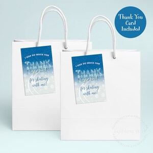 May include: Two plain white paper gift bags with white twisted paper handles, each featuring a rectangular blue and white tag with the text I HAD SO MUCH FUN THANK you! for skating with me! and a blue circle with Thank You Card Included.