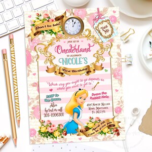 May include: Pink and white Alice in Wonderland themed first birthday party invitation with a gold border. The invitation features a clock, a key, a rabbit hole, and a cartoon image of Alice. The text on the invitation reads "Join us in Onederland to celebrate Nicole's First Birthday".