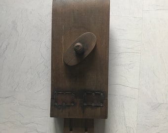 Wooden saddle block with leather hinge