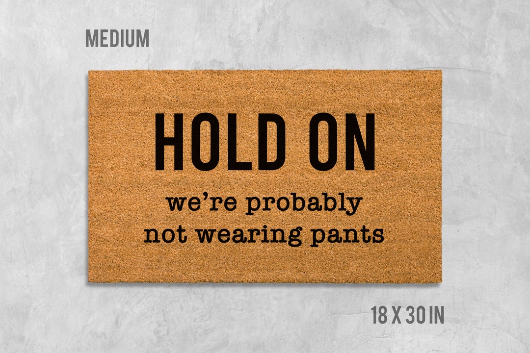 Hold on I'm / We're Probably Not Wearing Pants Doormat, Funny Doormat