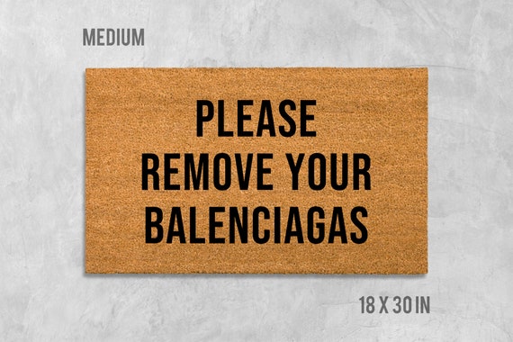 please remove your balenciagas rug