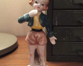 Shipping Included -Beautiful Vintage Girl in Shorts  and Little Blazer Porcelain Figure Made in Japan Resting on a Stump - Shipping Included