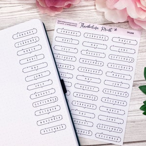 Adesivos mensais ovais com estrelas em preto e branco | Decoração e funcionalidade para planejamento | Adesivos para diário | Adesivos com letras cursivas
