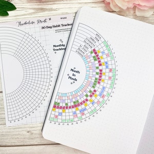 May include: A printable 30-day habit tracker with a circular grid. The grid is divided into 30 sections, each representing a day of the month. The tracker is designed to help users track their progress on a variety of habits, such as exercise, sleep, and hydration. The tracker is printed on white paper and has a black and white design.