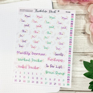 May include: A sheet of colourful planner stickers with a pastel colour scheme. The stickers feature a variety of designs, including clouds, stars, and the days of the week. The stickers also include titles for different sections of a planner, such as "Monthly Overview", "Workout Tracker", "Habit Tracker", "Purchases", "Goals", "To Do List", and "Brain Dump". The stickers also include numbers 1 through 31 for a monthly calendar.