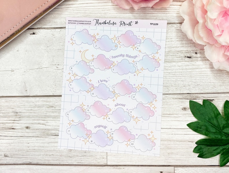 May include: A sheet of twenty cloud-shaped stickers with gold stars. Each cloud has a number and a space to write. The text "I love twenty things about myself" is printed on the sheet.