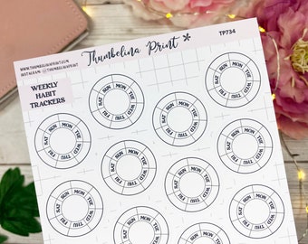 May include: A sheet of white sticker paper with nine black and white weekly habit tracker stickers. Each sticker has a circle with the days of the week written around the edge.