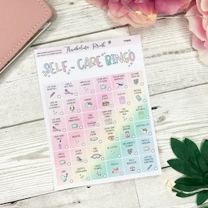 May include: A Self-Care Bingo card with a pastel rainbow gradient background. The card features a grid of self-care activities, each with a small illustration. Activities include journaling, taking a bath, and listening to music.