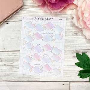 May include: A sheet of 20 cloud-shaped stickers with a pastel pink and blue ombre design. Each cloud has a gold star and a number. The text "Twenty Things" is written on one cloud, "I love" on another, "about" on another, and "myself" on another.