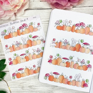 May include: A sheet of stickers and a journal page featuring a fall theme. The stickers and journal page have illustrations of pumpkins, mushrooms, and leaves in shades of orange, red, and green. The stickers have the text "Thuthbelina Print".