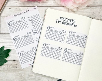 May include: A printable sheet of stickers for a bullet journal or planner. The stickers are black and white and feature a microphone and headphones. The text on the stickers reads "Podcast" and "Episodes".