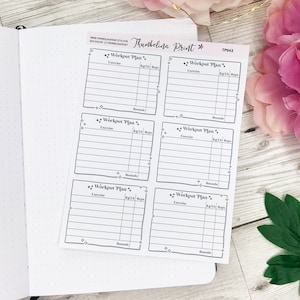 May include: A set of six black and white printable workout plan stickers with a decorative border. Each sticker has space to write the exercise, weight, reps, and rounds.