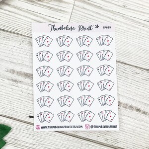 May include: A sheet of 18 stickers featuring a repeated design of four playing cards with a red diamond suit. The stickers are on a white background with the text "Thumbelina Print* TP685" at the top.