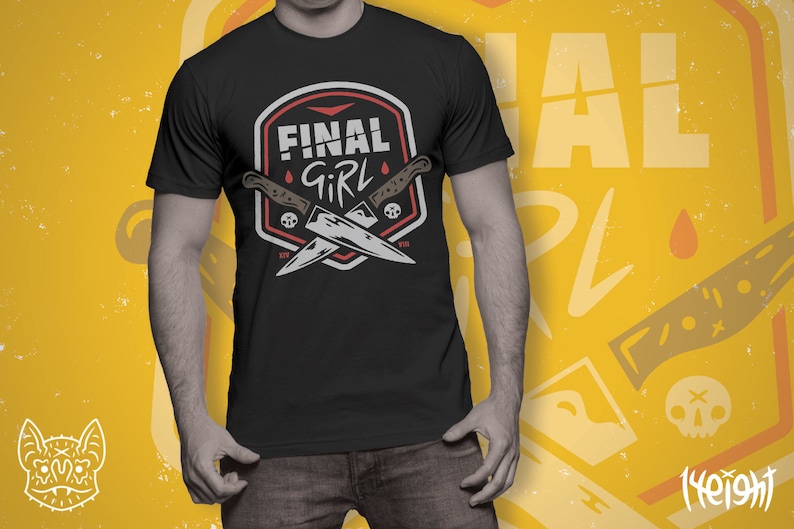 K&ouml;nnte beinhalten: Schwarzes T-Shirt mit einer roten und wei&szlig;en Grafik von zwei gekreuzten Messern und dem Text "Final Girl".