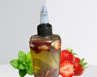 Sonnengeküsst und beruhigt: Erdbeerkernöl mit getrockneten Erdbeeren und Minze