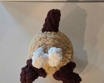 Peluche de trasero de gato hecho a mano a crochet
