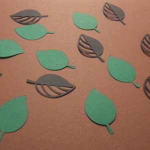 Stanzteile / Blätter grün / Blätter schwarz / Bastelzubehör / Scrapbooking Materialien