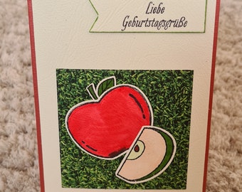 Birthday card " Dear birthday greetings " red apple with apple slice