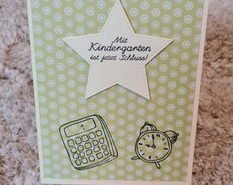 Kindergarten is now over - Congratulation card , Calculator , Alarm clock