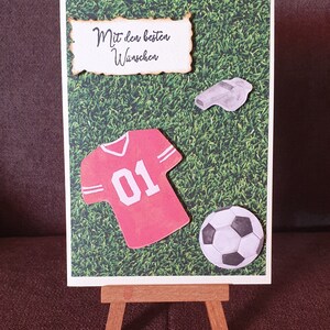 Geburtstagskarte " Mit den besten Wünschen " Fussball , Trikot , Pfeife , Rasen