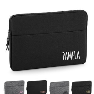 May include: Black laptop sleeve with a zipper closure and a white name "PAMELA" embroidered on the front.  Four additional sleeves are shown in the background with different names and colors.