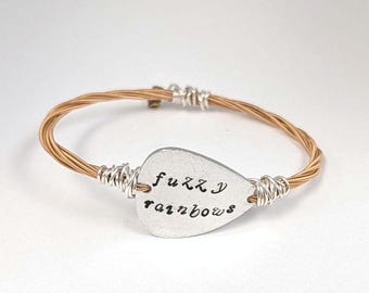 Billy Strings inspired bracelet/jewelry.  Fuzzy Rainbows upcycled guitar string bangle