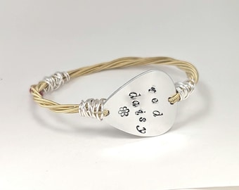 Red Daisy recycled guitar string bangle.  Billy Strings inspired bracelet/jewelry.