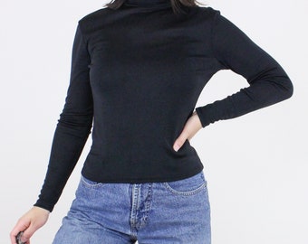 Vintage 90's black semi-sheer turtleneck top, Rapture Apparel, long sleeve, fitted, dark, grunge, gothic, moody, casual, layering piece