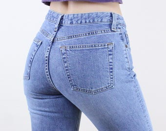Vintage late 90's 29W Gap jeans, medium light wash blue denim, mid rise, boot cut, Y2K, 2000s style, stretch denim, casual, classic