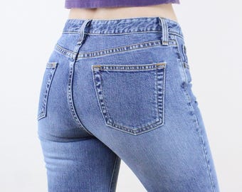 Vintage late 90's 30W Gap jeans, medium light wash blue denim, mid rise, boot cut, Y2K, 2000s style, stretch denim, casual, classic