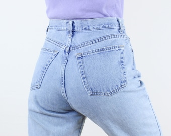 Vintage 90's 29W Gap jeans, light wash blue denim, high rise, tapered leg, mom jean, thrashed, worn, knee hole, soft, broken in, grunge