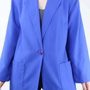 Vintage 90's blue blazer, muted royal blue, rayon poly blend, pockets, collared, single purple button closure, shoulder padding, lightweight image 2
