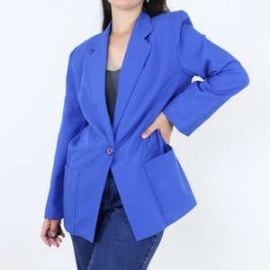 Vintage 90's blue blazer, muted royal blue, rayon poly blend, pockets, collared, single purple button closure, shoulder padding, lightweight image 1