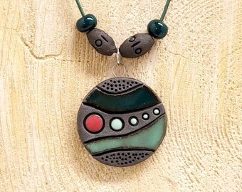 Dark Clay Ceramic Necklace with Abstract  Design, Red, Blue and Green