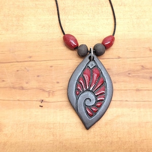 Dark Clay Ceramic Necklace Leaf Shaped Pendant  with Red and Blue Accents