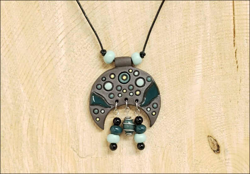 Dark green Glaze and Dangles Dark Clay Ceramic Necklace Half Moon Design With Circles