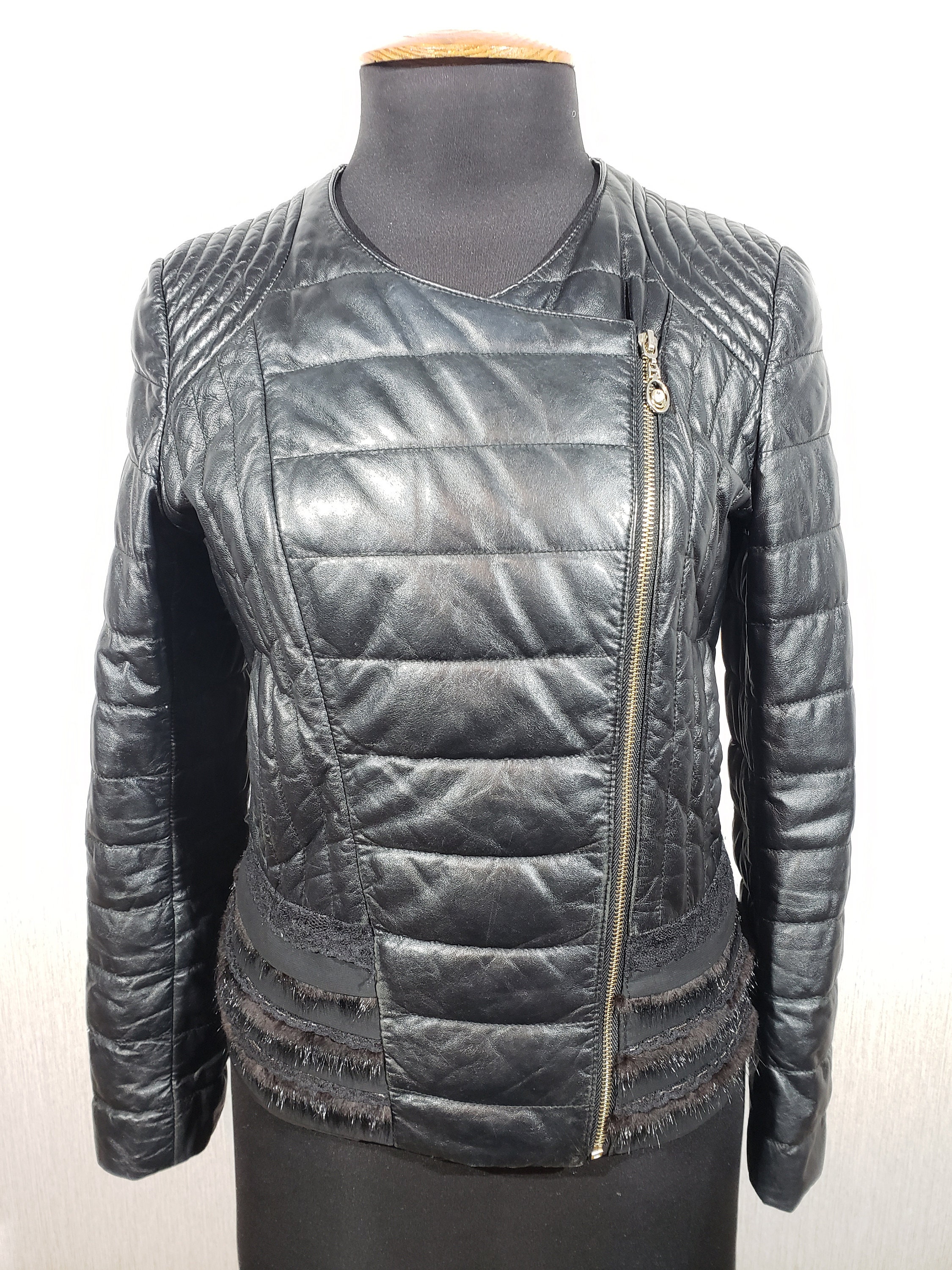 Jolie veste en cuir matelass pour femme avec fermeture clair en