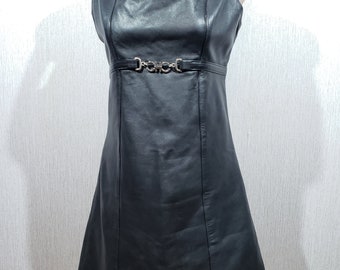 Stylish black leather dress. Leather dress made of black leather with a plastic zipper at the back.