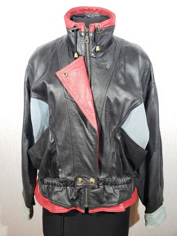 Stylish combined women's leather jacket. Black wom