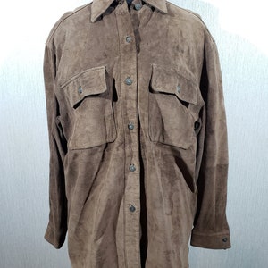 Stylish women&#39;s shirt made of genuine suede. Brown women&#39;s shirt made of genuine leather.