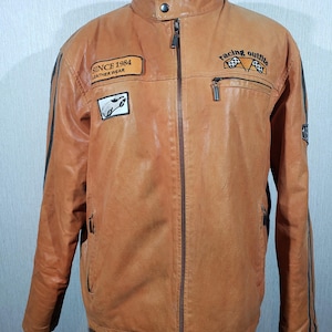 Veste en cuir pour homme élégante à rayures. Veste de sport marron en cuir véritable.