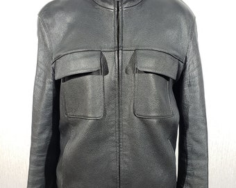 Stylish black men's leather jacket. Sports black jacket made of genuine leather.