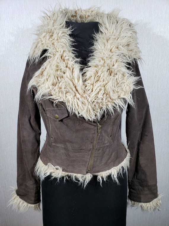 Cozy women's brown leather jacket with faux fur. W