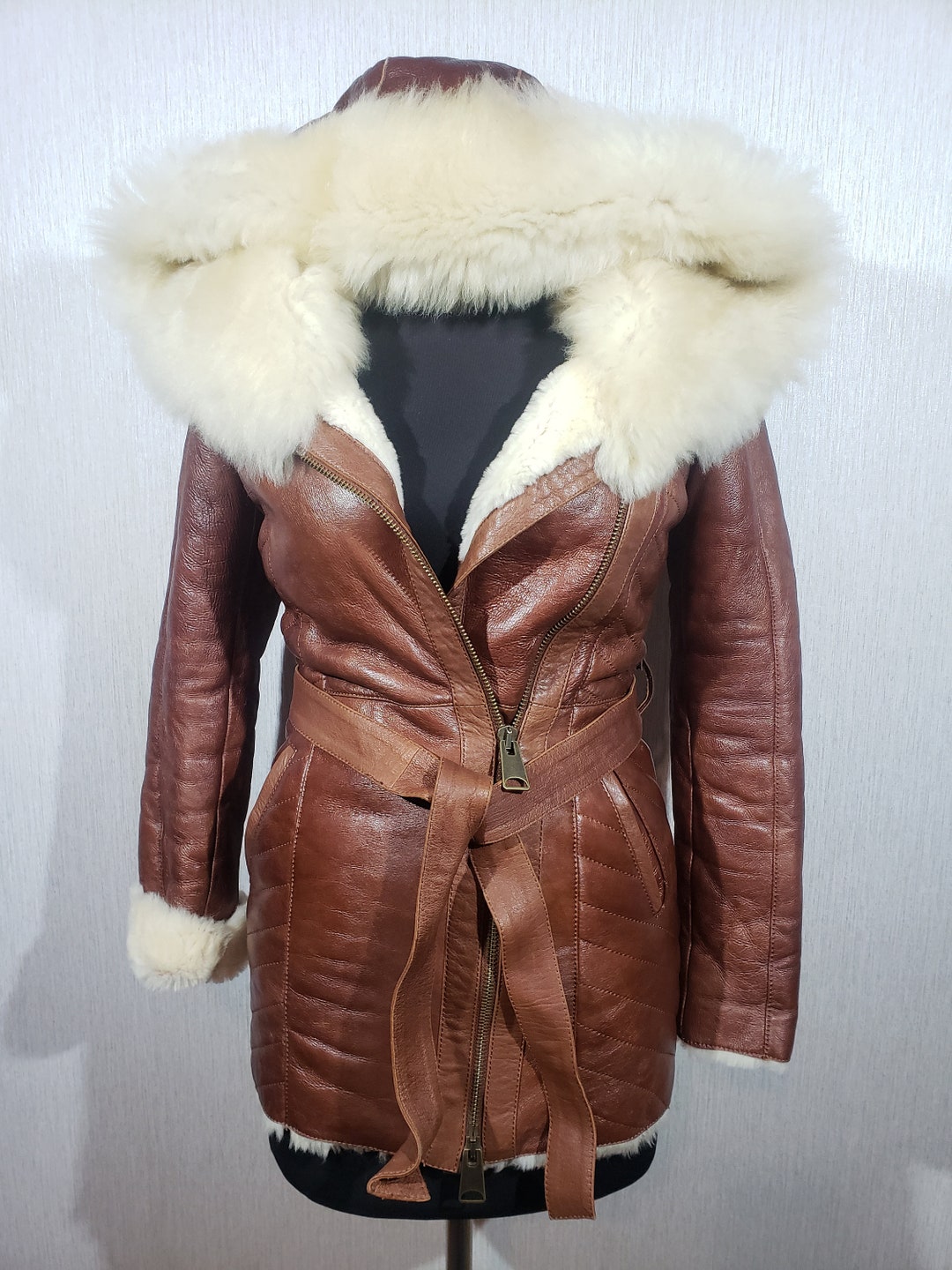 Wonderful Women's Warm Sheepskin Coat Made of Genuine Fur. Stylish